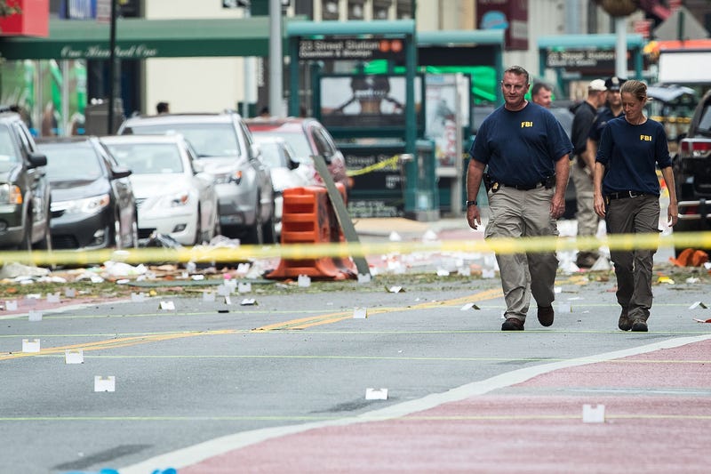Two members of the FBI work at the scene of an explosion in the Chelsea neighborhood of Manhattan on Sept. 18, 2016, in New York City. Drew Angerer/Getty Images