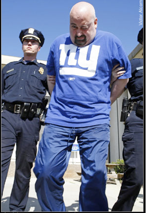 Illustration for article titled A Handsome Giants Fan Makes A Dignified Perp Walk