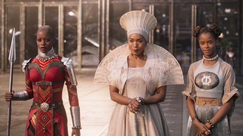 Florence Kasumba as Ayo, Angela Bassett as Queen Ramonda, and Letitia Wright as Princess Shuri in Black Panther