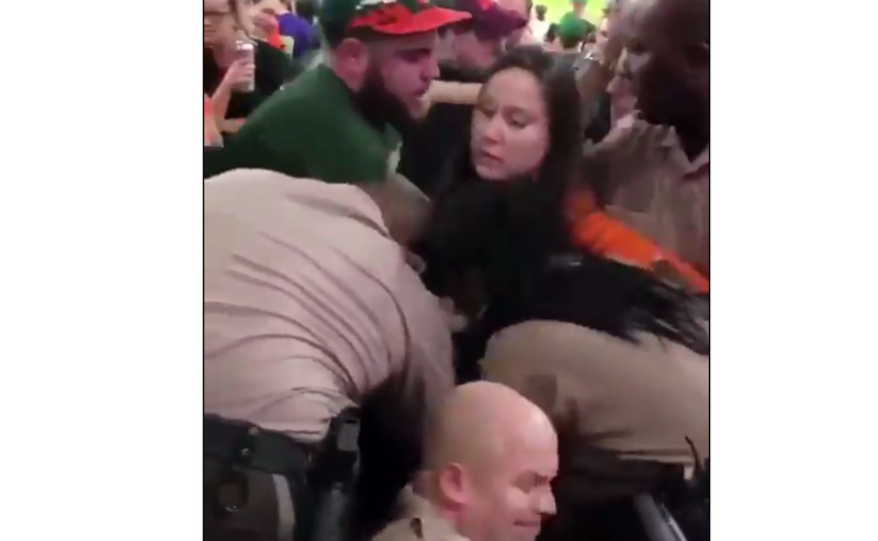 Video Shows Cop Punching Disorderly Female Fan After She Slaps Him At University Of Miami 