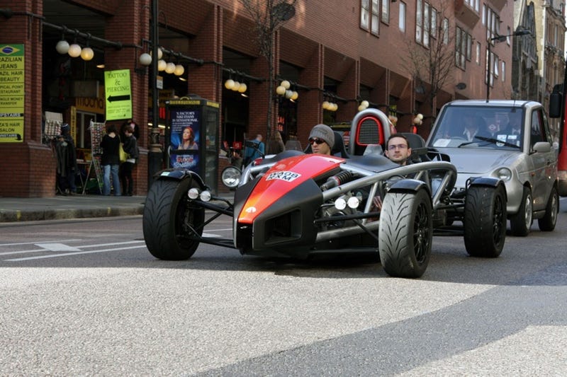 Ariel Atom vs. REVA G-Wiz in London