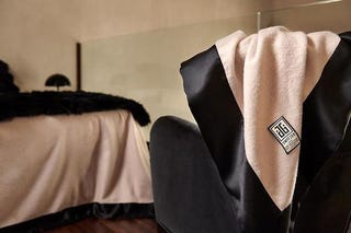 Illustration for article titled Behold Beauty in a Black. Now Voyager Luxury Throw Blanket