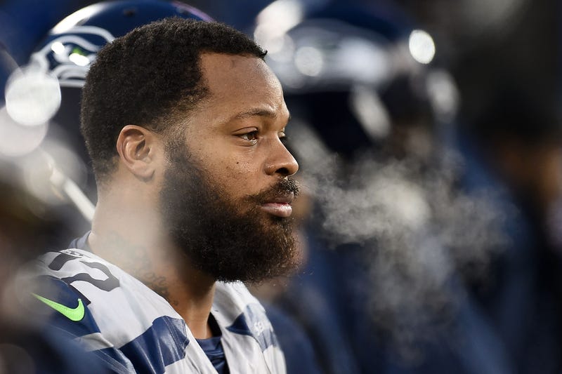 Michael Bennett Sits For National Anthem After ...