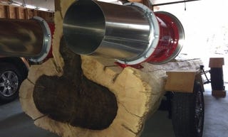 Illustration for article titled This Canadian 'Timber King' Is Making A 'Cedar Rocket' Car From A Tree