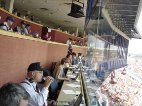 Illustration for article titled So A Blogger And A Pig Walk Into A Press Box ...