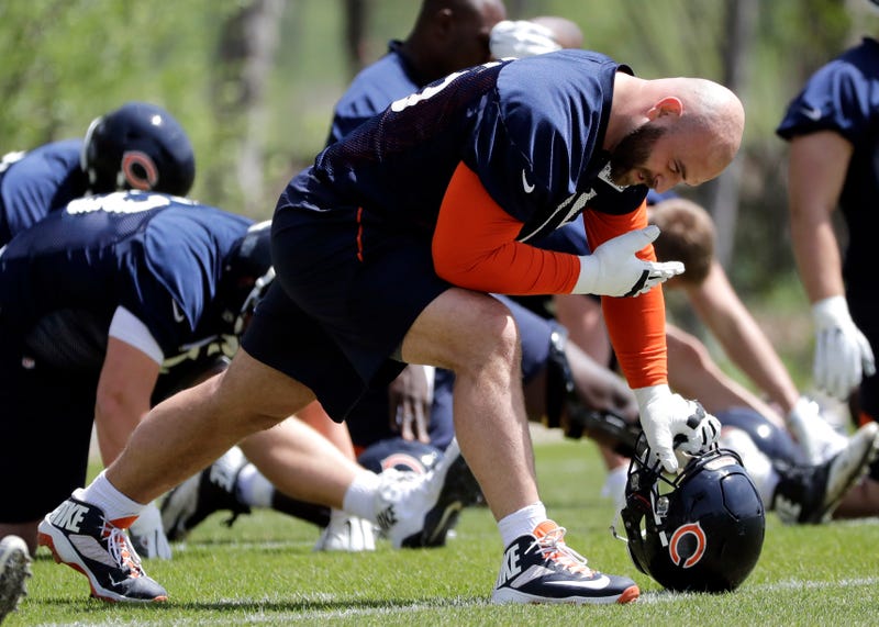 Illustration for article titled Kyle Long Tried To Beat A Teammate With His Own Helmet And Then Barfed