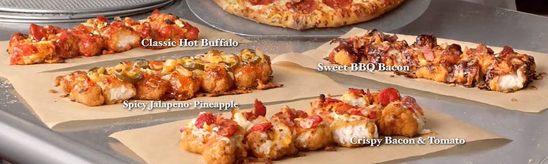Illustration for article titled Domino's is making pizza with breaded chicken as the crust
