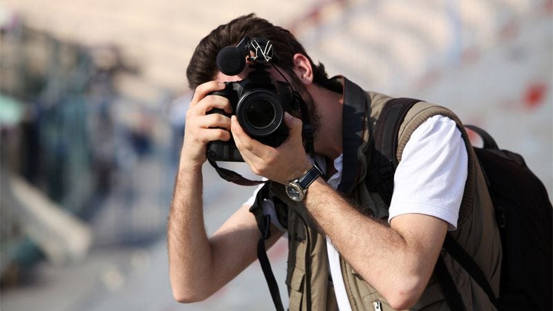 Illustration for article titled This Photographer Revealed The Human Side Of Our Enemies And We Hate Him For It