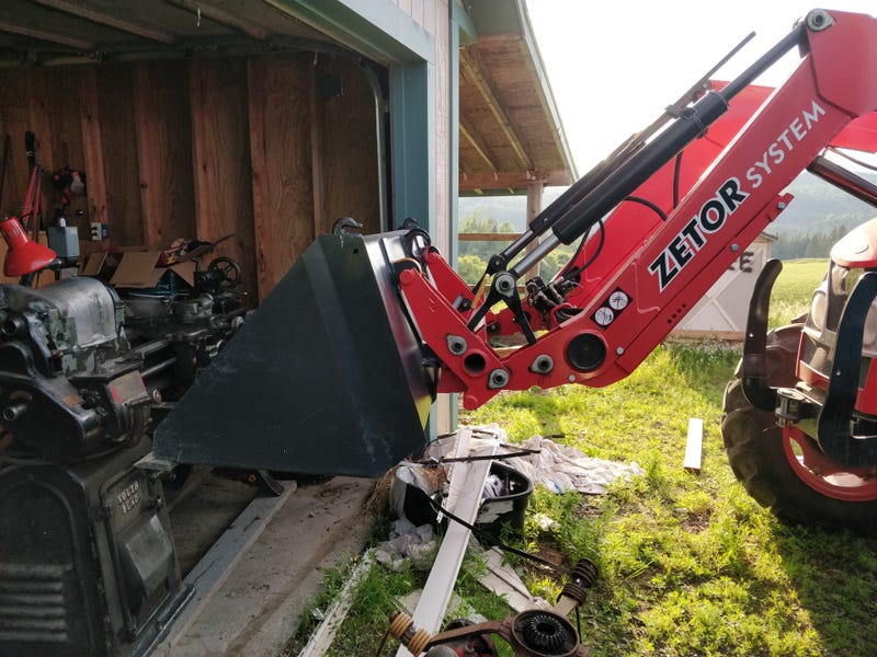 Based on how much the truck squated and the tires squished on the Zetor, I think it weighs more than 800lbs.