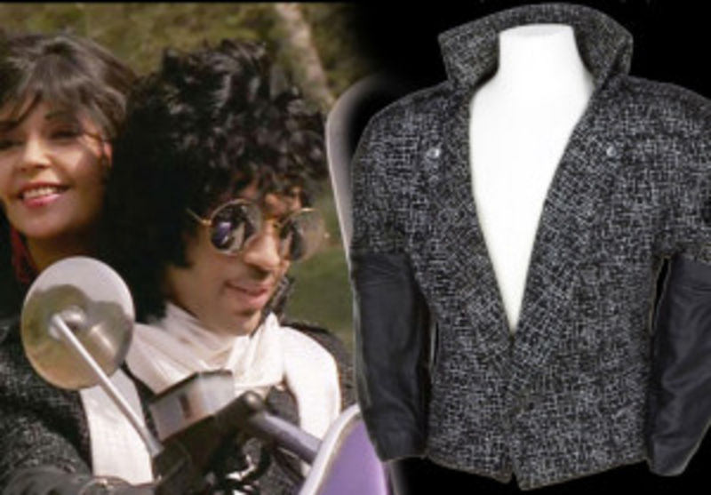 The ruffled shirt and black and white jacket owned by Prince each sold for $96,000 at auction, July 2016.