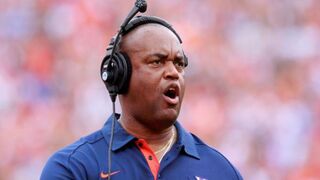 Virginia Cavaliers head coach Mike London watches from the sidelines against the Richmond Spiders at Scott Stadium Sept. 1, 2012, in Charlottesville, Va.  Geoff Burke/Getty Images