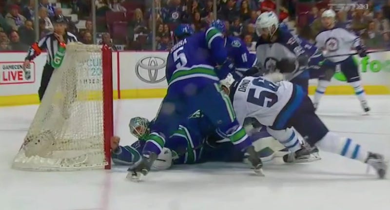 Illustration for article titled Canucks Goalie Loses His Glove, Makes A Barehanded Save