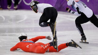 North Korean Speed Skater Appears To Trip Opponent After Falling