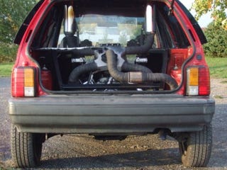 Illustration for article titled V8 Powered Ford Festiva Torque Steers Itself Into Our Hearts