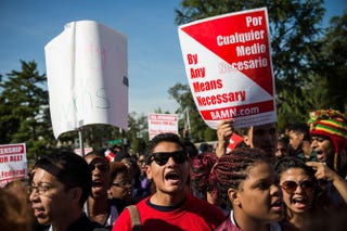 Students protest in support of affirmative action outside the Supreme Court during oral arguments in Schuette v. Coalition to Defend Affirmative Action on Oct. 15, 2013.Andrew Burton/Getty Images