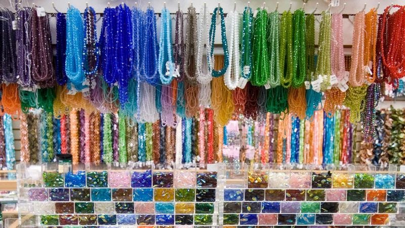 Illustration for article titled All-Knowing Invisible Hand Of Free Market Once Again Guides Millions In Profits To Nation’s Bead Stores