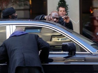 Illustration for article titled Caption This: 50 Cent's Rolls Royce Holds Its Own Key Hostage