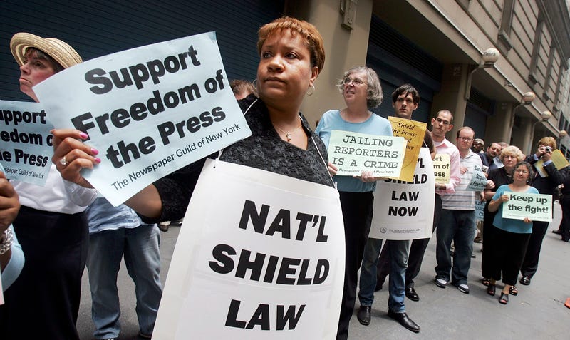 Dana Canedy (center), then a New York Times assignment editor for national news, and other members of the Newspaper Guild of New York protest in support of Time magazine reporter Matthew Cooper and New York Times reporter Judith Miller outside New York Times headquarters July 6, 2005, in New York City. Canedy is leaving the Times in part to work on the movie adaptation of her book, A Journal for Jordan. Mario Tama/Getty Images)