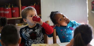 Children eating breakfast in a Head Start program (John Moore/Getty Images)