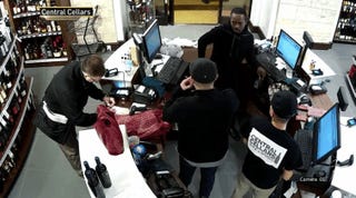 Otis Gooding (black man in center) right before an e-cigarette exploded in his pocketYouTube Screenshot