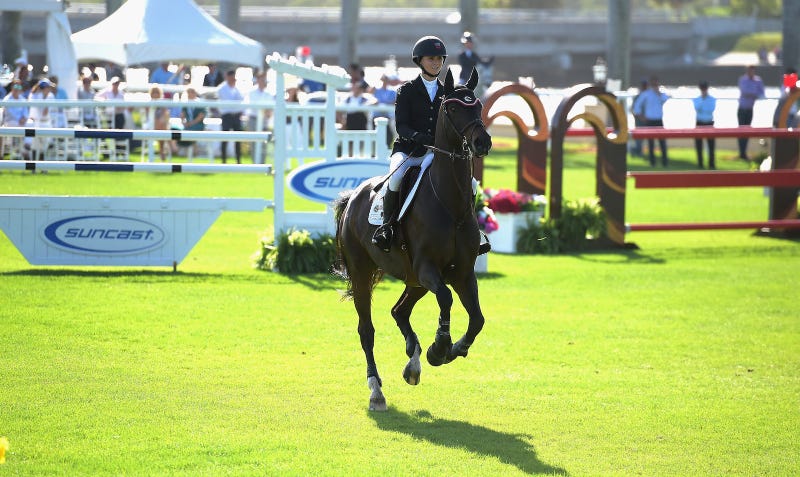 Georgina Bloomberg competing at Donald Trump’s Mar-a-Largo Club in 2015. Image via Getty.