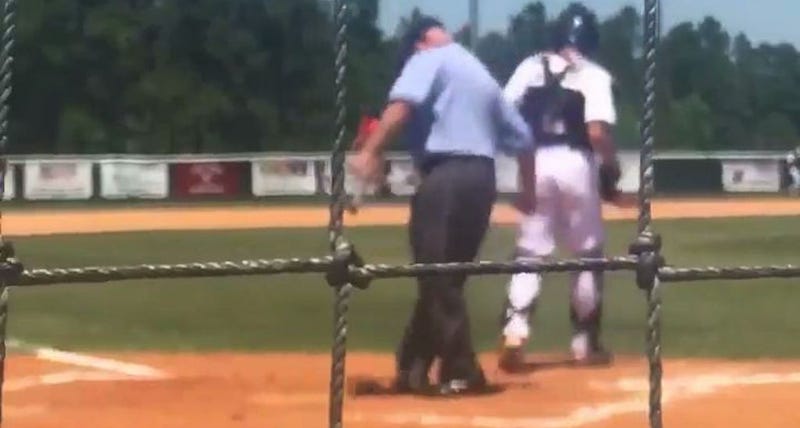 Illustration for article titled Why Is This Ump Kicking Dirt Onto The Plate?