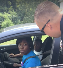 Driver being stopped in Halifax, Va., by police giving out ice cream cones instead of ticketsFacebook