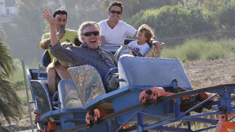 Illustration for article titled It's Friday, so here are photos of Gary Busey on a roller coaster and Nick Nolte riding a bumper car