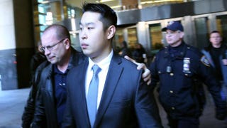 New York City Police Officer Peter Liang is escorted out of court after he was charged with manslaughter, official misconduct and other offenses on Feb. 11, 2015, in the Brooklyn borough of New York City.Spencer Platt/Getty Images