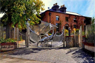 Illustration for article titled House Guarded By Dragon Gate Can Be Yours For Only 2.4 Million Euros