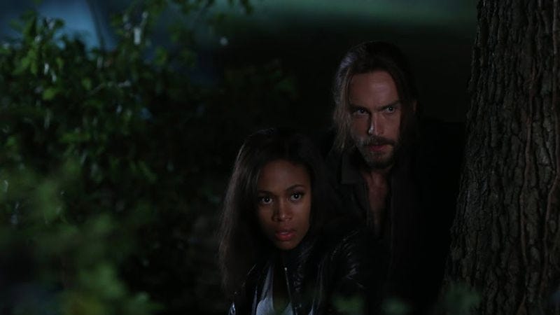 Nicole Beharie (left), Tom Mison, tree