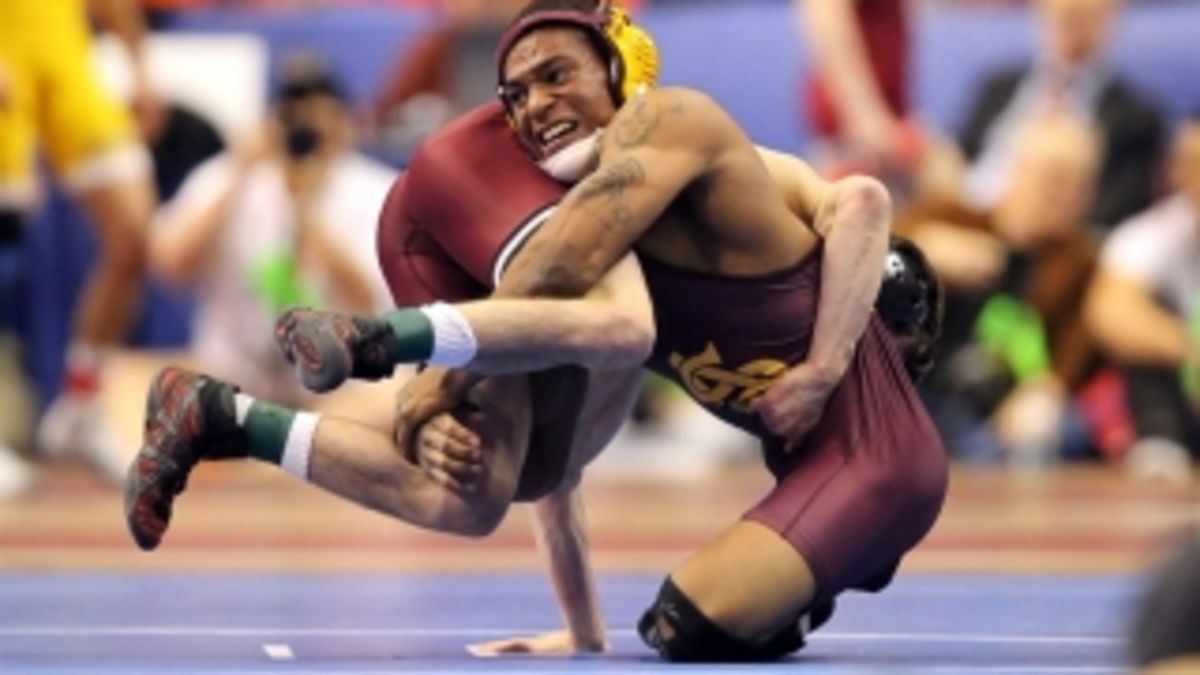 Anthony Robles takes down his opponent.