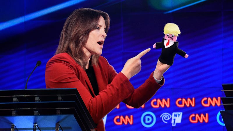 Illustration for article titled Marianne Williamson Sternly Addresses Homemade Trump Puppet About Immigration In Fiery Debate Exchange
