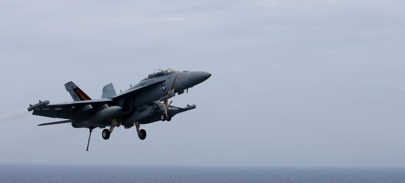 An F/A-18 Hornet approaches the deck of the USS John C. Stennis off of Japan back in June. (AP Photo/Shizuo Kambayashi)