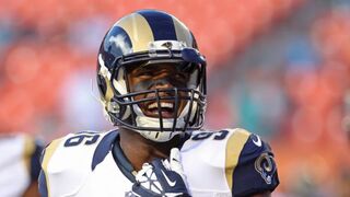 Defensive end Michael Sam of the St. Louis Rams reacts during pregame workouts before his team met the Miami Dolphins at Sun Life Stadium Aug. 28, 2014, in Miami Gardens.Marc Serota/Getty Images