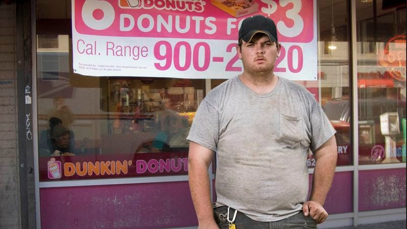 Illustration for article titled Man Who Eats Breakfast At Dunkin' Donuts Every Morning And Enjoys The 'Saw' Films Allowed To Vote