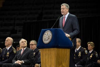 New York Mayor Bill de Blasio speaks at the New York City Police Department graduation ceremony at Madison Square Garden in New York City on Dec. 29, 2014.Andrew Burton/Getty Images
