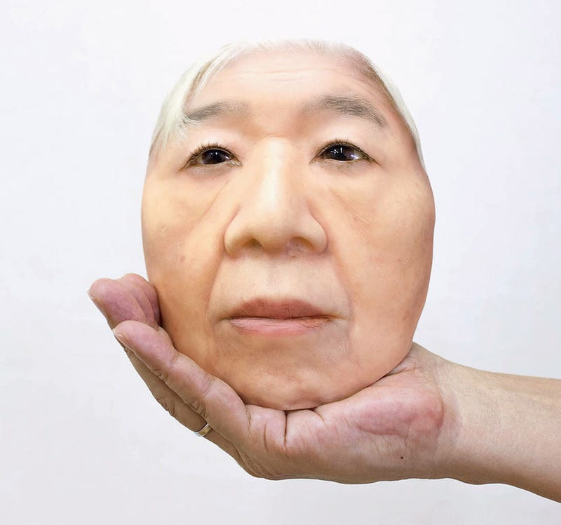 Illustration for article titled Surreal Photos Of Disembodied Android Faces Are Horrifying