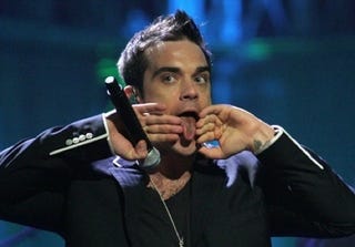 Illustration for article titled Would You Like To Sing With Robbie Williams?