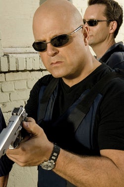 Illustration for article titled DC Lawmaker Wants Cop Guns to Have Mini FPS Cameras