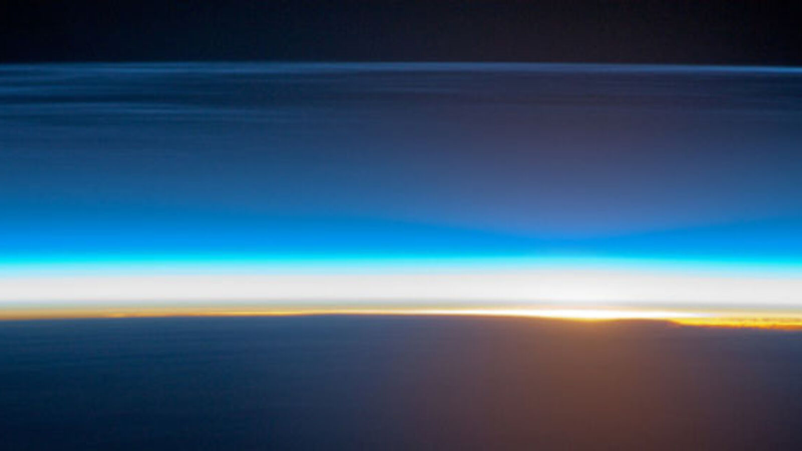 NASA Captures the Rising Sun Lighting Up the Midnight Sky