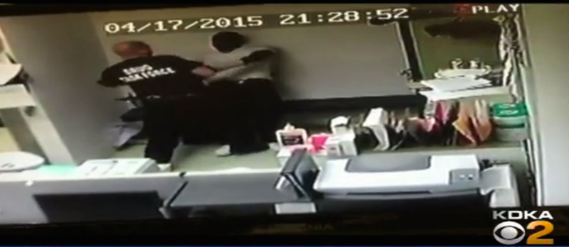 Elizabeth Borough Police Officer Garrett Kimmel is seen on surveillance footage shoving, choking and hitting 21-year-old Joshua Brooks, who was in custody and shackled to a bench by his ankle in Elizabeth, Pa. KDKA