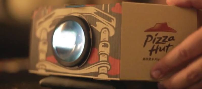 Illustration for article titled Now Your Pizza Hut Box is (Kinda, Sorta) a Movie Projector