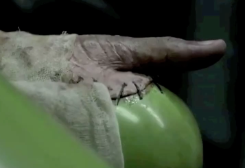 Illustration for article titled Google's Android Robot Goes Under a Gross Surgery for the PSP Phone