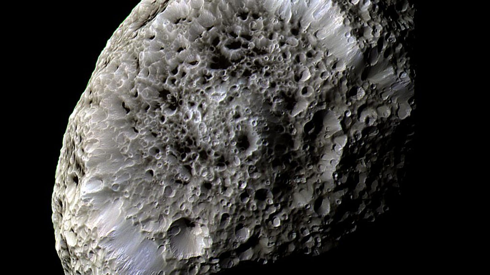 There S More To Hyperion S Weirdness Than Its Sponge Like Surface