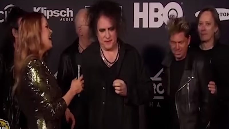 Illustration for article titled This interview with The Cure's Robert Smith is beautifully awkward