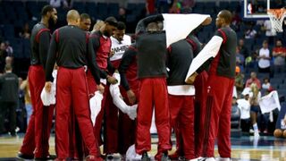 Miami Heat players discard white warm-up shirts at mid-court before Mondayâs Game 4 win against the Charlotte Bobcats in a show of solidarity with the Los Angeles Clippers players.     Youtube