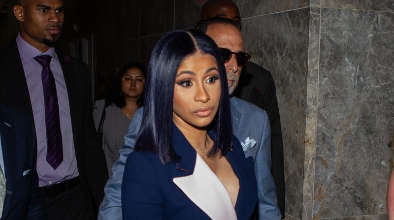 Cardi B leaves her arraignment on two felony assault counts and other misdemeanors June 25, 2019 in the Queens borough of New York City.