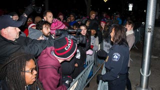 Minneapolis Police Chief Janee Harteau speaks with media and protesters separated by a barricade outside the 4th Precinct police station Nov. 20, 2015, in Minneapolis.Stephen Maturen/Getty Images