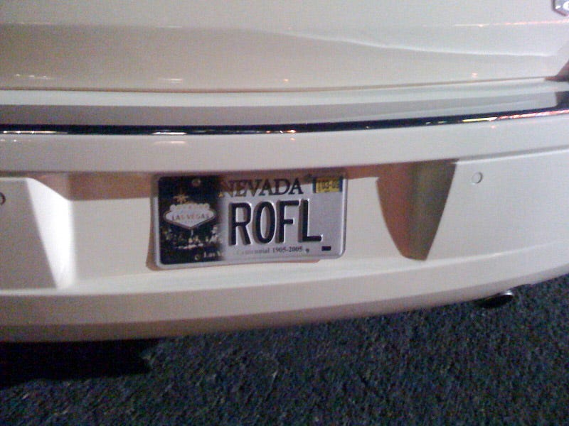 Illustration for article titled Las Vegas Chrysler 300 Gets "ROFL" License Plate